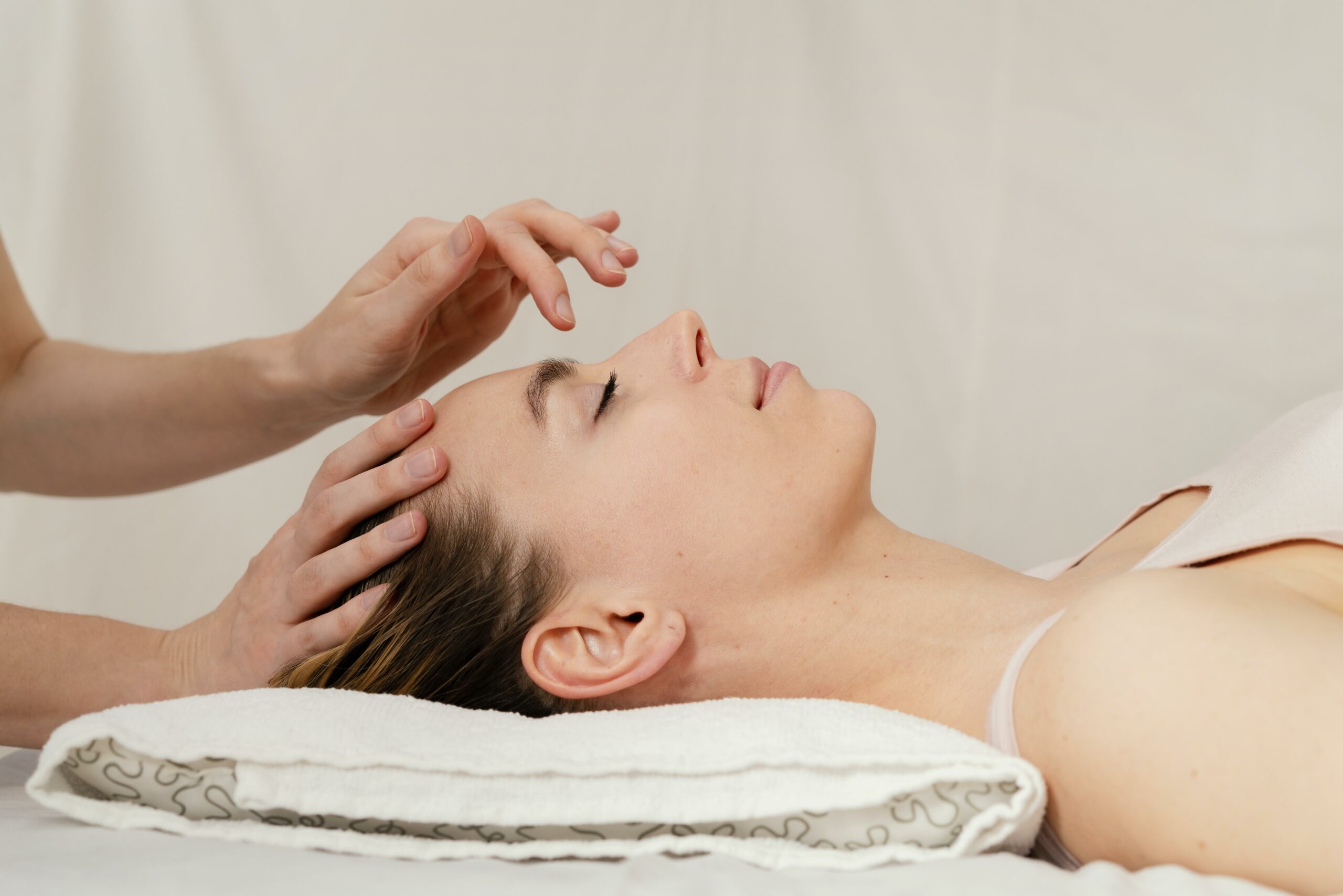 close-up-therapist-massaging-patient-s-head